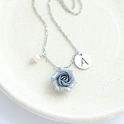 Earrings with a blue rose and a handmade pearl pendant
