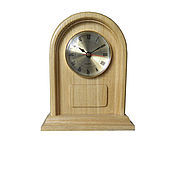 A wall clock. White beech. Old gold. Time