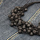 The black beads are made of natural linen and lava - light and three-dimensional decoration for every day.
