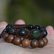 Украшения handmade. Livemaster - original item A set of two bracelets - a sandalwood bracelet and a braided talisman. Handmade.