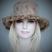 Felted women's hat.Warm wool gray-white beanie hat