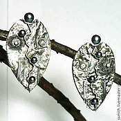 Кольцо серебряное с натуральным кахолонгом "Кованное"