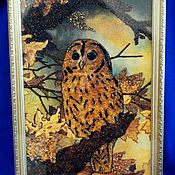 pendant with amber. Cat, owl and other animals