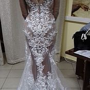 Lace wedding dress in floor