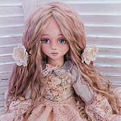 elia. textile collectible doll