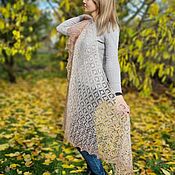 Knitted asymmetrical shawl from angora