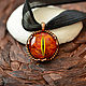 Pendant with a fiery eye. Glass lampwork beads, bronze, casting, dragon, flame, orange, red. The Eye Of Sauron. Gift for lovers of fairy tales, fantasy, JRR Tolkien.
