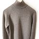 Sweater heathered gray color (solid gray color). I.e., visible transitions to light gray and even the color of coffee with milk.
