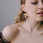 Earrings made of wood with gold asymmetrical