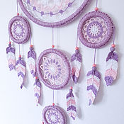 Crocheted pink dreamcatcher with ribbons