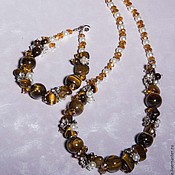 Украшения handmade. Livemaster - original item Jewelry set made of natural tiger eye stones: beads and bracelet. Handmade.
