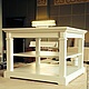 Coffee table with square top. has two compartments for storing books, magazines, Souvenirs. Decorative plates with flutings give the table uncluttered and aesthetically pleasing appearance. The differ