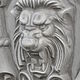 Lion concrete bas-relief No. №2 on the cartouche, grinning