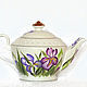 Teapot with painting 