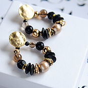 Multi-row bracelet made of rock crystal, coral, agate, citrine