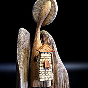 A Christmas Angel. The author's work. Figurine carved from wood