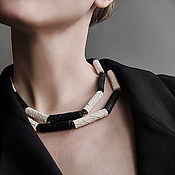 Outremer.  Necklace-square of wood