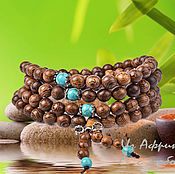Bracelet made of cowry and wooden beads