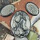 A set of three cabochons. Color - Grey and black. Shape - oval
