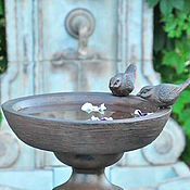 Дача и сад handmade. Livemaster - original item Bird feeder-drinking bowl made of concrete under cast iron garden decor. Handmade.