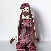 Textile doll with removable clothing