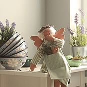 Тильда. Интерьерная новогодняя игрушка "Сонный Снеговик" в пижамке