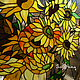 A fragment of stained glass in the technique of Tiffany based on the painting of van Gogh's `Sunflowers`.
