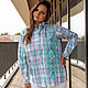 Shirt in men's style in a checkered turquoise with an ornament