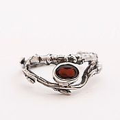Ring with grape vines and stone