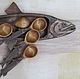 Здесь на блюдо в качестве `рыбок` выложены деревянные резные ложки с рукоятками-рыбами