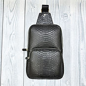 Сумки и аксессуары handmade. Livemaster - original item Men`s sling bag, made of genuine python leather, in black.. Handmade.