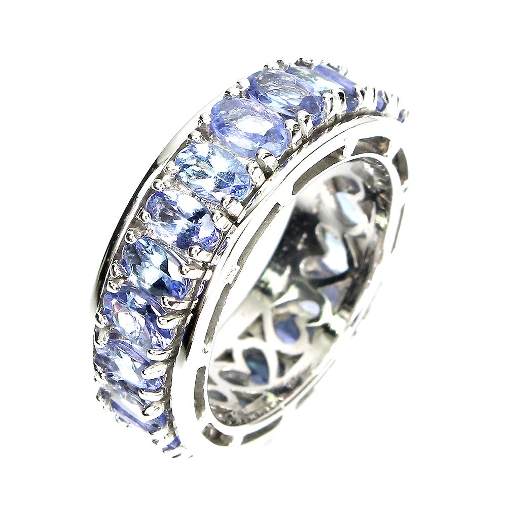 ЭКСКЛЮЗИВНОЕ серебряное кольцо с крутящейся серединой и танзанитами .