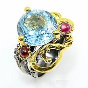 Украшения handmade. Livemaster - original item Silver ring with blue Topaz and rhodolite. Handmade.
