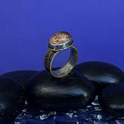 Серебряное кольцо с рутиловым кварцем и горным хрусталём