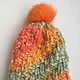 hat knitted. a fun hat. multi-colored hat. all colors of the rainbow.
