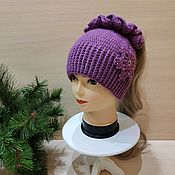 Winter hat with crystals and fur pompom