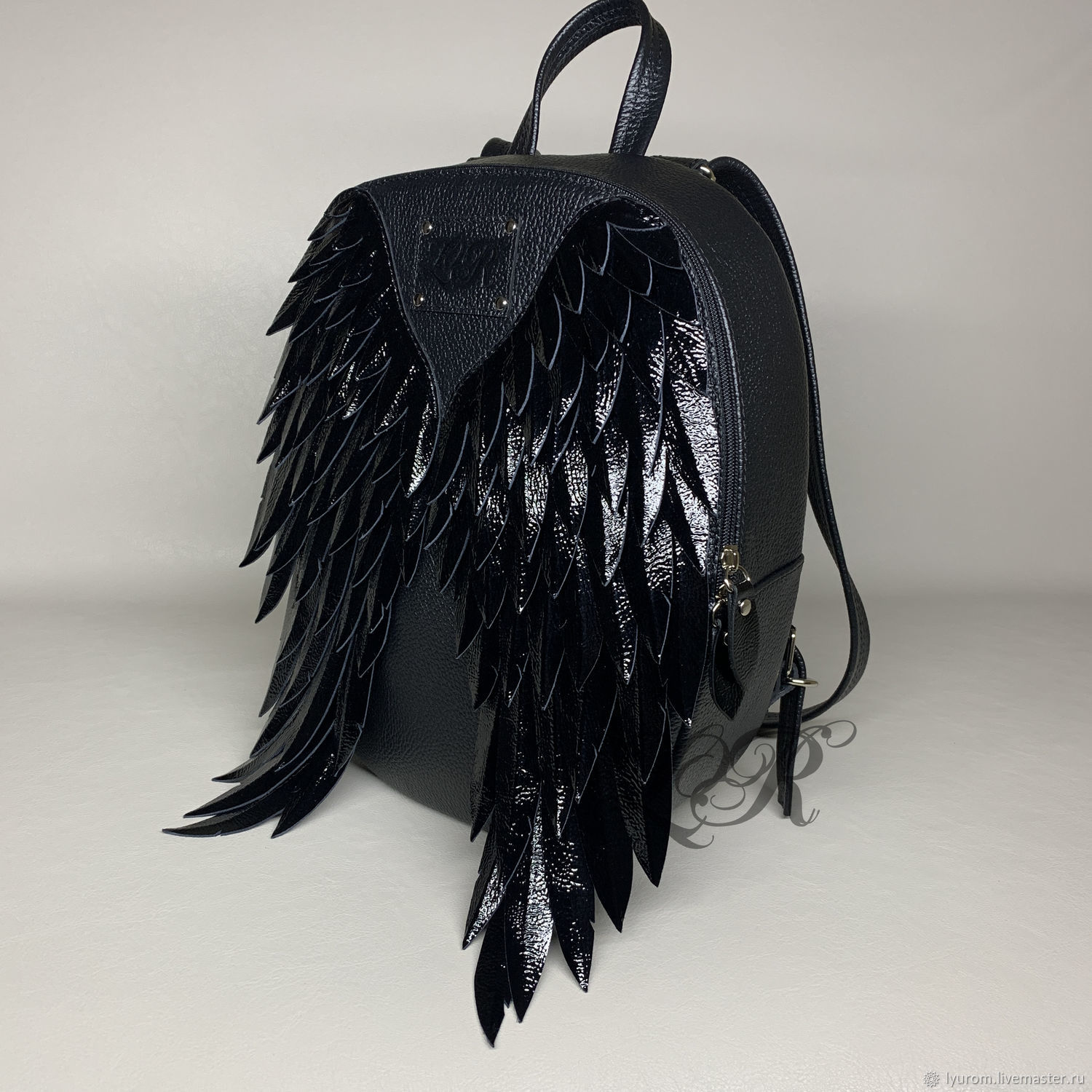 wings leather backpack