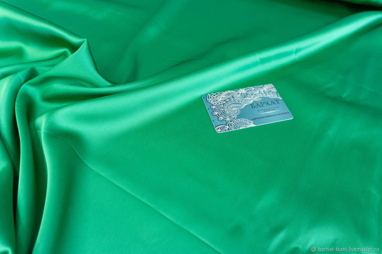 Зеленый атлас ткань