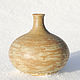 Бежевая керамическая ваза ручной работы `Пески севера` это гончарная керамика. Ваза выполнена мастером из глины вручную на гончарном круге, обожжена и покрыта глазурями.