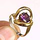 Ring of SILVER 925 with elements of gilding, decorated with amethyst
