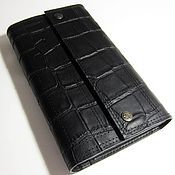 Clutch volume with two leather straps. Small handbag